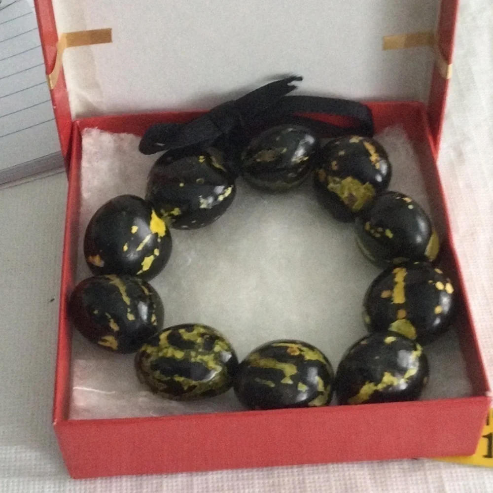 Woman’s Stretch Bracelet made in Hawaii Black the color symbolizes power #25